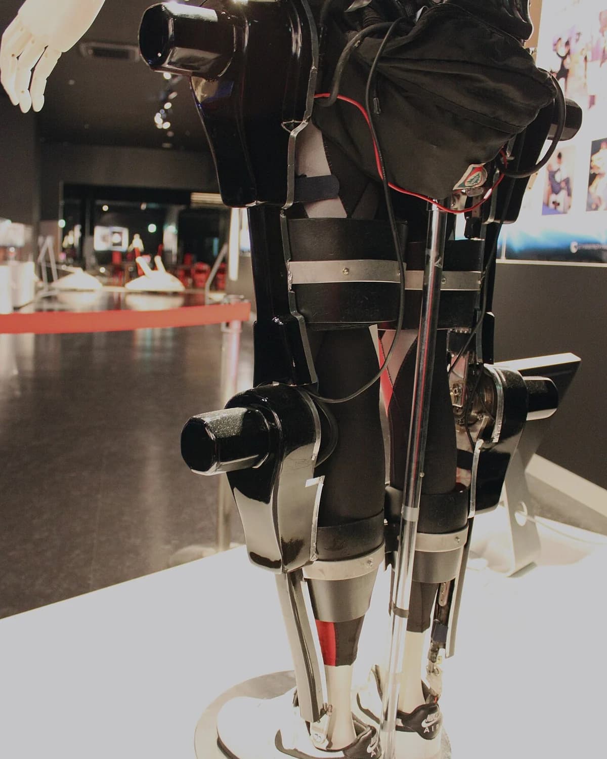 Close-up of a person wearing the Cyberdyne HAL lower-limb exoskeleton.